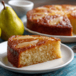 Easy Italian Pear Cake – Moist, Simple & Delicious 7 Delicious Easy Italian Pear Cake topped with fresh slices and powdered sugar.