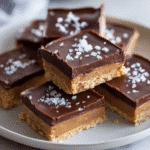 Healthy & No Bake Cookie Dough Bars: The Ultimate Guilt-Free Treat 9 Stack of healthy no-bake cookie dough bars with glossy chocolate topping.
