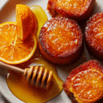 Easy Orange Ginger Honey Cakes | A Cozy Citrus Dessert 7 Delicious Orange Ginger Honey Cakes topped with a drizzle of honey