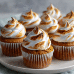 Sweet Potato Cupcakes with Toasted Ginger Meringue 9 Sweet potato cupcakes topped with toasted ginger meringue.