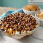 Easy Turtle Cheesecake Dip Recipe – Perfect for Parties & Holidays 5 Delicious Turtle Cheesecake Dip served with graham cracker dippers