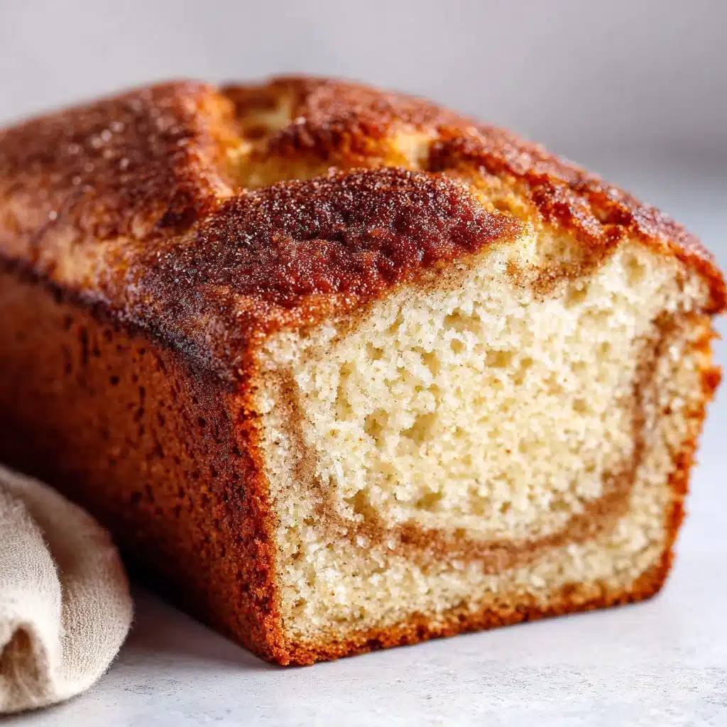 Delicious Cinnamon Gluten-Free Eggnog Bread served on a festive table