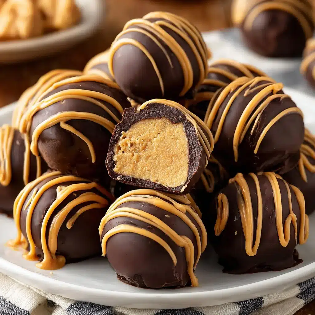 Irresistible Peanut Butter Truffles That Will Delight Your Taste Buds 4 Homemade peanut butter truffles coated in chocolate and garnished with nuts