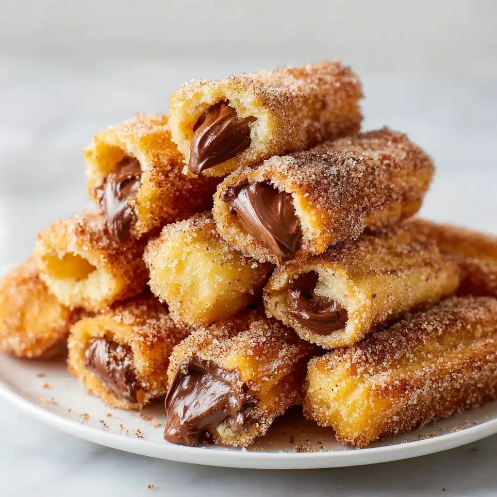 Delicious homemade churro bites filled with Nutella, ready to enjoy.
