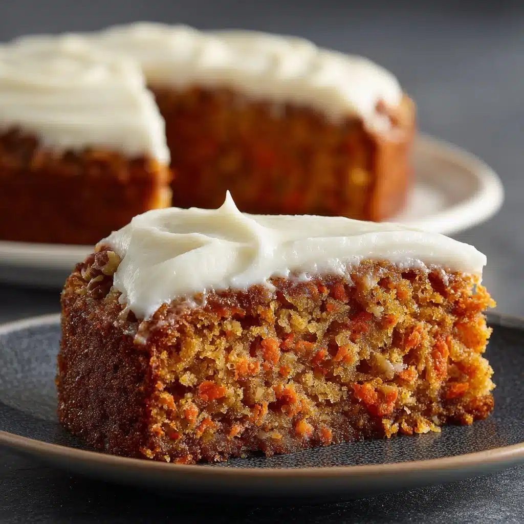 Slice of easy homemade carrot cake topped with cream cheese frosting