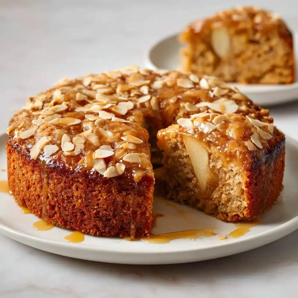 Home Page 8 Healthy oatmeal apple cake topped with fresh apple slices and cinnamon.